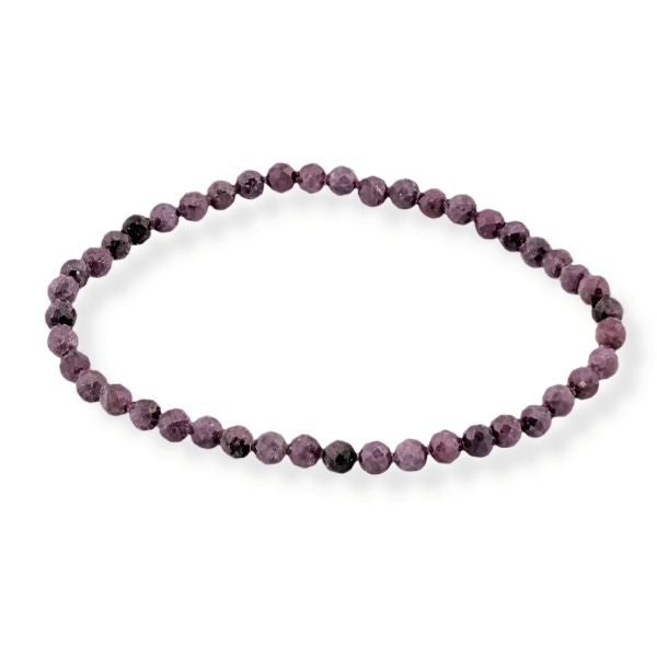Red beaded bracelet on a white background