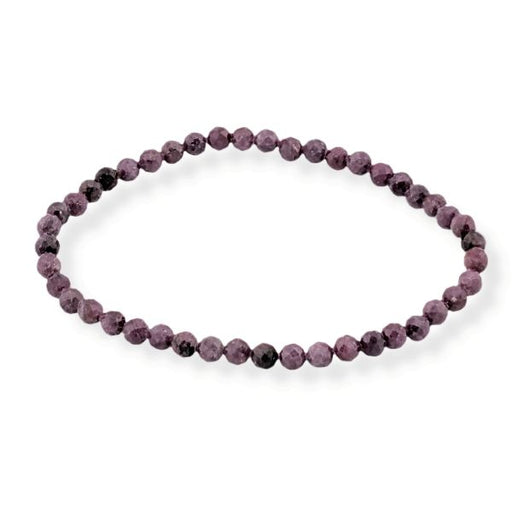 Red beaded bracelet on a white background