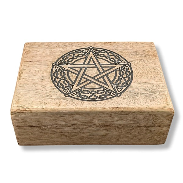 Wooden box with a pentagram design on a white background
