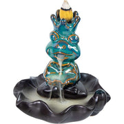 Decorative incense burner with blue and gold design on a white background