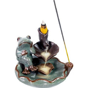 Ceramic incense burner with frog design on a white background