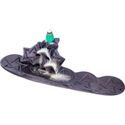 Incense burner with pentagram design on a white background