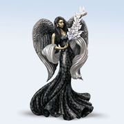 Statue of an angel with dark hair and wings, holding a white flower against a light blue background.