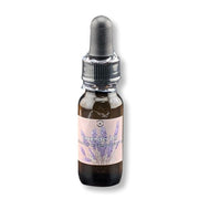 Bottle of lavender oil with a dropper on a white background