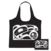 Black tote bag with white tribal design on a white background