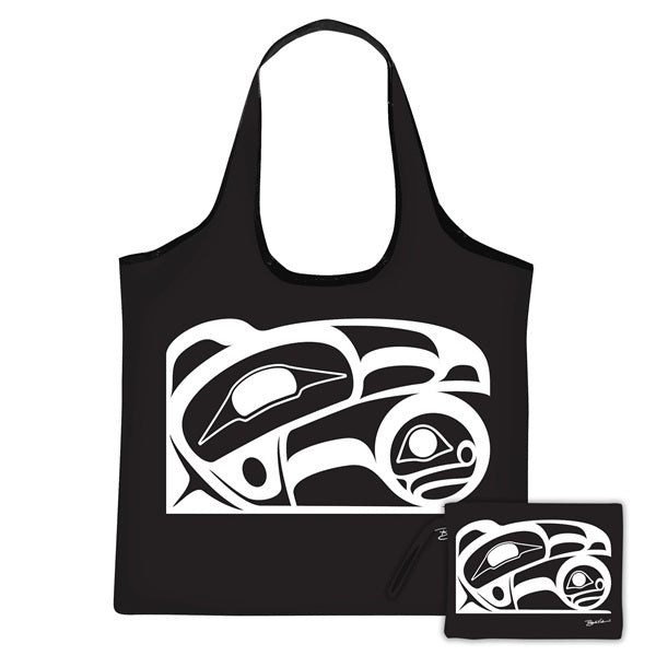 Black tote bag with white tribal design on a white background