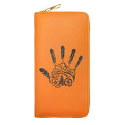 Orange wallet with a black handprint design on a white background