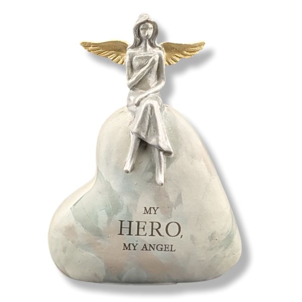 Statue of an angel sitting on a heart-shaped base with 'My Hero, My Angel' text on a white background