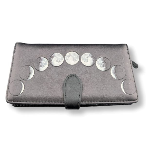 Black wallet with silver moon phase embellishments on a white background