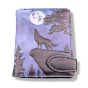 Wallet with wolf and moon design on a white background