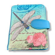 Small wallet with dragonfly and floral design on a light blue background