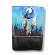 Crossbody bag with wolf and dreamcatcher design on a blue sky and forest background