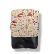 Small pouch with mushroom pattern on a beige background