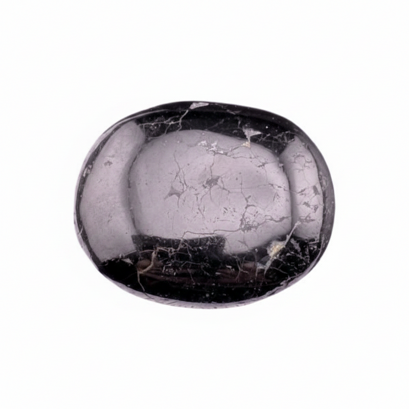 Polished crystal stone with black and gray patterns on a white background