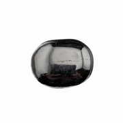 Black and reflective stone on a white background