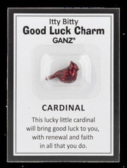 Red cardinal good luck charm on a GANZ branded card with text.