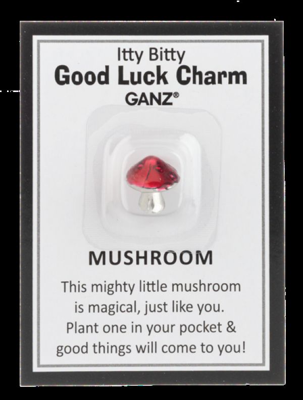Red mushroom charm on a GANZ branded card with text.