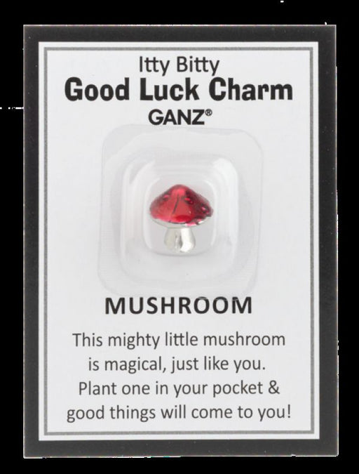 Red mushroom charm on a GANZ branded card with text.
