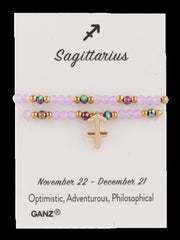 Bracelet with astrological symbol on a GANZ branded card