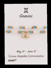 Bracelet with Gemini zodiac symbol on a GANZ branded card