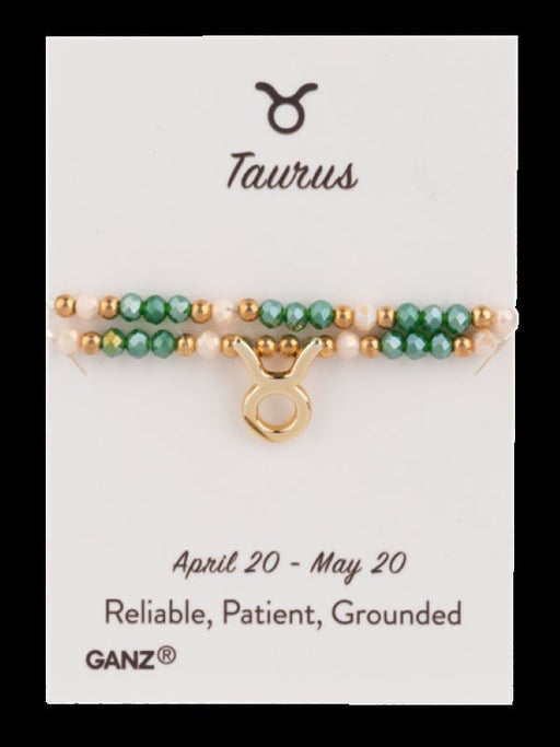 Taurus zodiac bracelet on a Ganz branded card with astrological details.