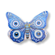 Decorative butterfly with blue and white patterns on a white background