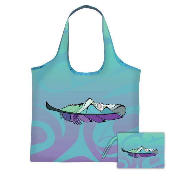 Reusable shopping bag with mountain design on a white background