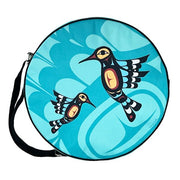 Round bag with bird design on a blue background