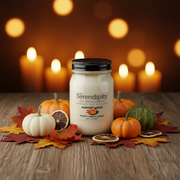 a 16oz jar candle harvest moon in a fall setting