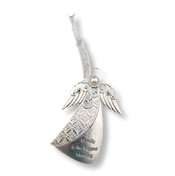 A silver angel-shaped hanging ornament with engraved decorative wing details and the phrase 'Family is the biggest blessing' on the body, plus a small pearl-like bead at the top, shown on a white background.