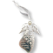 Silver angel ornament with engraved floral wing pattern, a pearl accent, and a hanging tag that reads 'Faith makes everything possible,' suspended from a white ribbon on a white background.