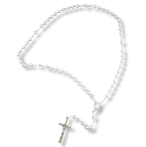 Pearl necklace with a silver cross pendant on a white background