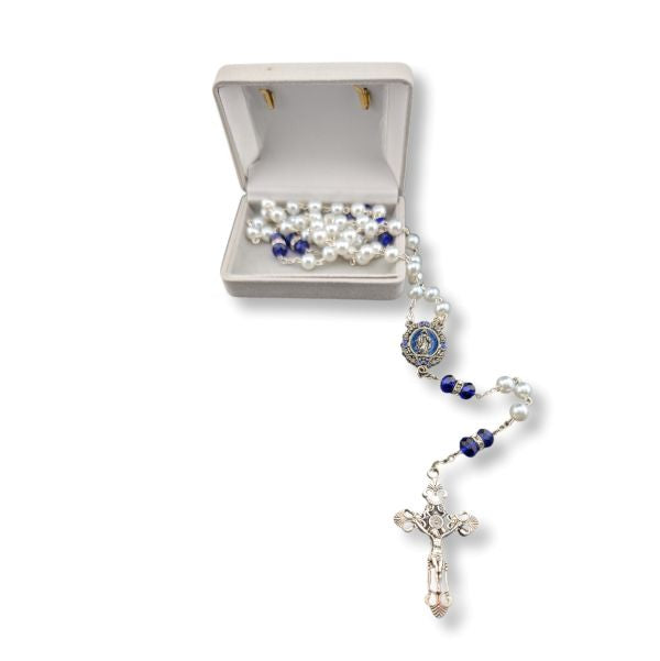 Rosary with pearl and blue stone beads on a white background