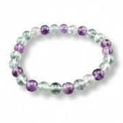 Multicolored beaded bracelet on a white background