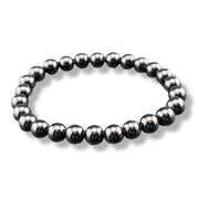 Black beaded bracelet on a white background
