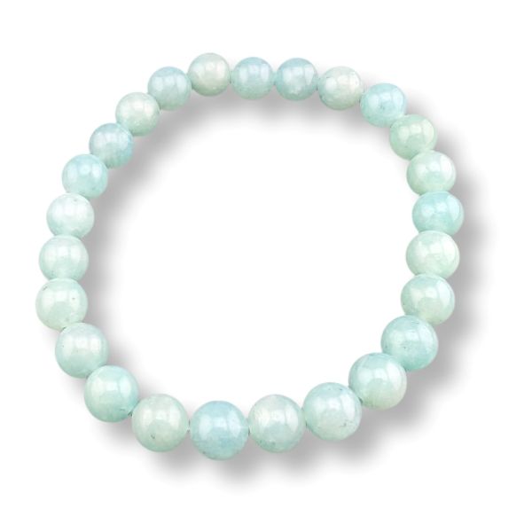 Beaded bracelet with light green beads on a white background