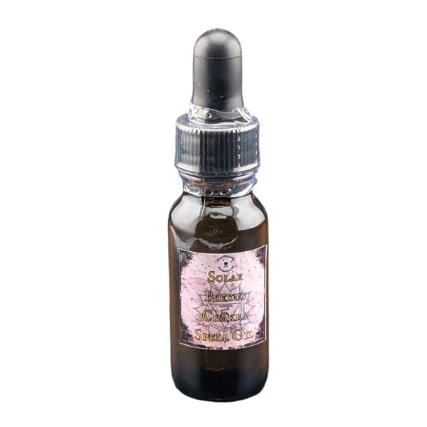 A small amber glass dropper bottle with a black rubber bulb and silver cap, featuring a pink label that reads 'Solar Plexus Chakra Oil'.