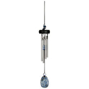 Wind chime with pebble-like design on a white background