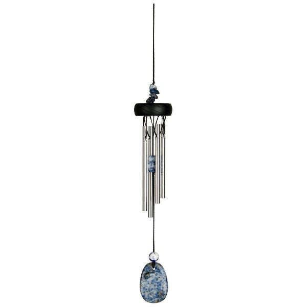 Wind chime with pebble-like design on a white background