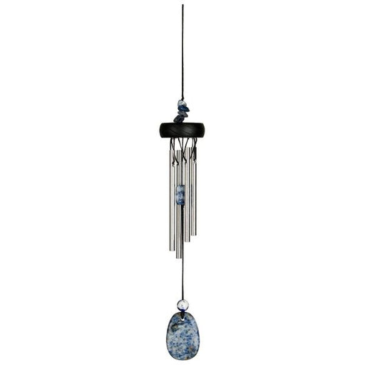 Wind chime with pebble-like design on a white background