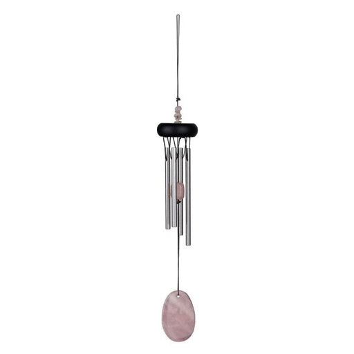 Black wind chime with pink stone on a white background