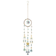 Decorative hanging mobile with beads and celestial elements on a white background