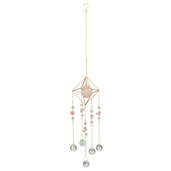 Decorative hanging crystal with pink stone and beads on a white background