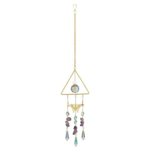 Decorative hanging crystal with geometric design on a white background