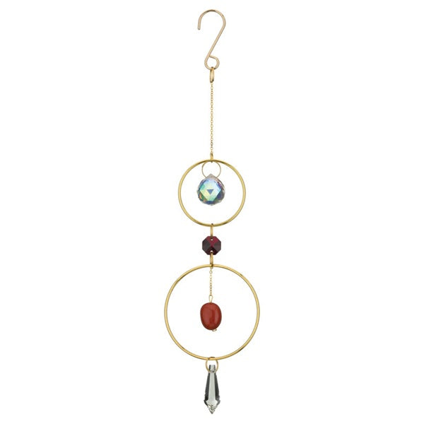 Decorative hanging ornament with gold loops, beads, and crystal on a white background
