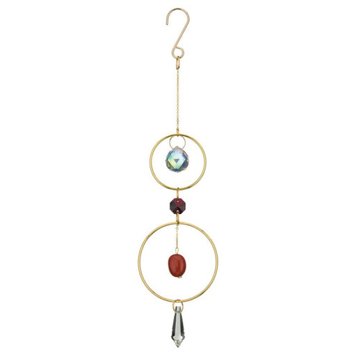 Decorative hanging ornament with gold loops, beads, and crystal on a white background