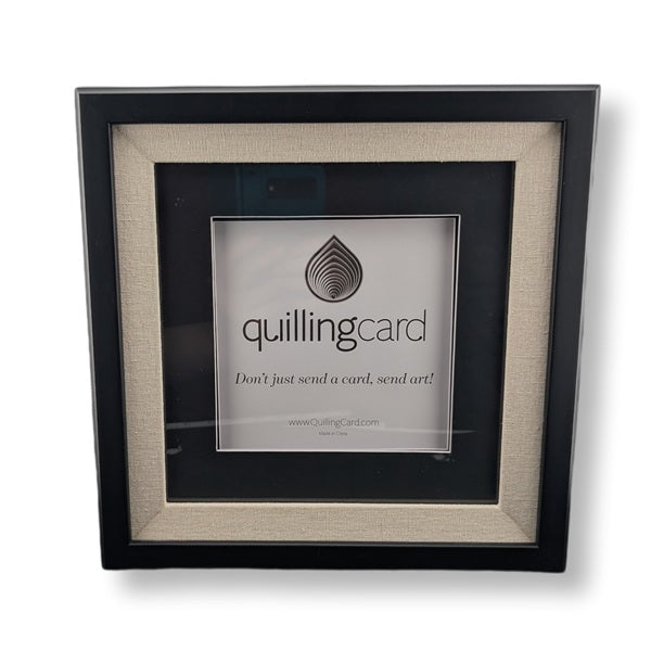 Framed picture with 'quillingcard' logo and text on a white background
