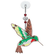 Decorative hummingbird ornament with green wings and red accents on a white background
