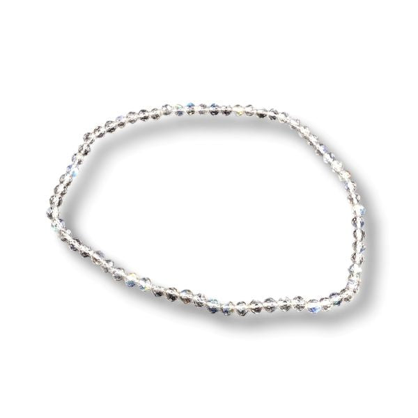 A delicate labradorite faceted bracelet with clear faceted crystals, arranged in an oval shape on a white background with a soft drop shadow.