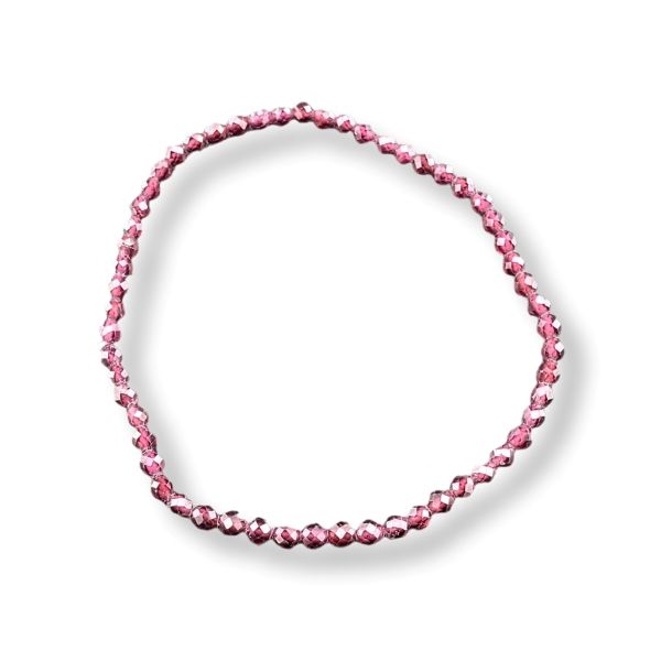 A single strand of faceted pink beads arranged in an oval loop on a clean white background.